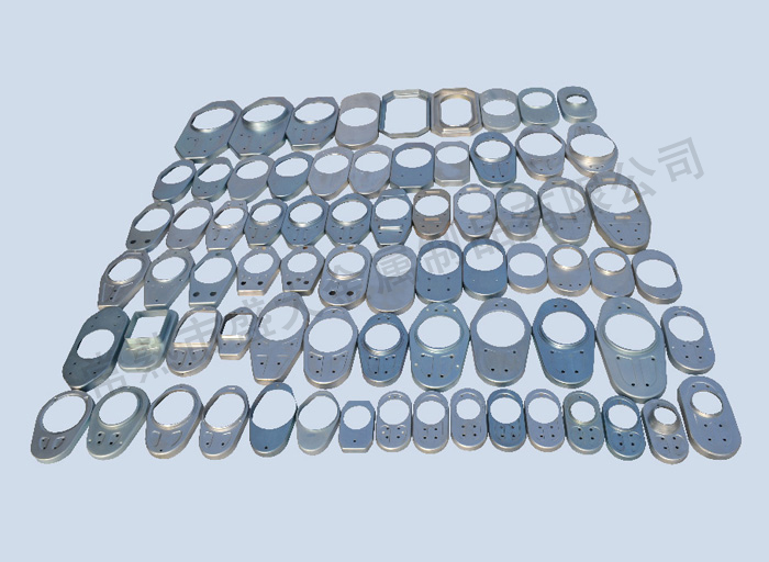 Refractory material protective shell